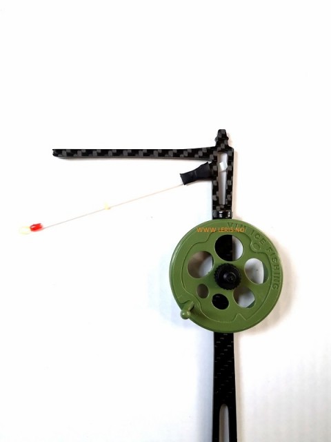 Nappindikator montert innover.